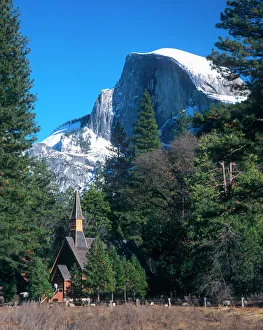 Californias Yosemite National Parks Half Dome rises above the multi denominational Californias Yosemite National Parks Half Dome rises above the multi denominational