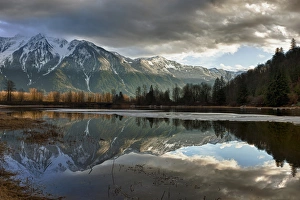 Canada, British Columbia, Agassiz, Seabird Island Road, storm clearing over mountains at sunset Canada, British Columbia, Agassiz, Seabird Island Road, storm clearing over mountains at sunset