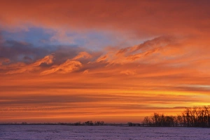 Canada, Manitoba, Deacons Corner. Sunrise over the prairie in winter. Credit as Canada, Manitoba, Deacons Corner. Sunrise over the prairie in winter. Credit as