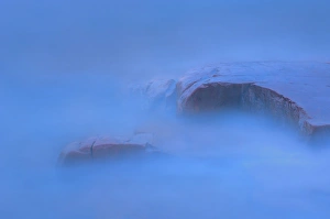 Canada, Ontario, Killarney Provincial Park. Waves and shoreline rocks at dusk. Credit as Canada, Ontario, Killarney Provincial Park. Waves and shoreline rocks at dusk. Credit as