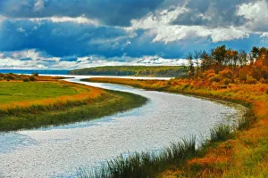 Canada, Saskatchewan, Green Lake. River and storm clouds Canada, Saskatchewan, Green Lake. River and storm clouds