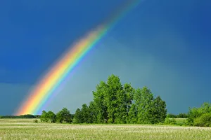 Canada, Saskatchewan, Wroxton. Rainbow over grassland Canada, Saskatchewan, Wroxton. Rainbow over grassland