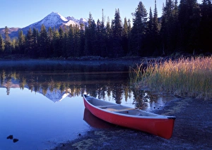 A canoe along the banks of Sparks Lake in the Oregon Cascades A canoe along the banks of Sparks Lake in the Oregon Cascades