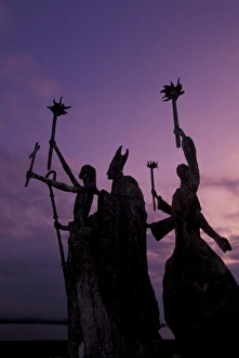 CARIBBEAN, Puerto Rico Slender statues on coatline at dusk CARIBBEAN, Puerto Rico Slender statues on coatline at dusk