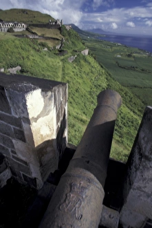 CARIBBEAN, St. Kitts Cannon from old brick fort aiming towrds the ocean CARIBBEAN, St. Kitts Cannon from old brick fort aiming towrds the ocean