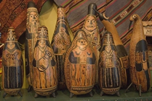 Carved gourds and other folk art on display in shop. Peru, Lima Carved gourds and other folk art on display in shop. Peru, Lima