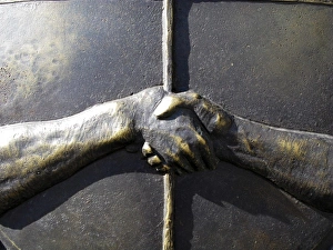 close up of the Argentine Seal: hands shaking close up of the Argentine Seal: hands shaking