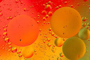 Close-up pattern of bubbles in oil and water mixture Close-up pattern of bubbles in oil and water mixture