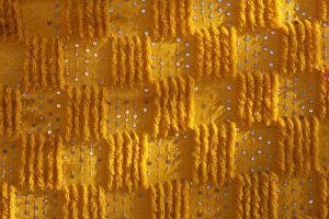 Close-up of vertical rug, hanged to the wall, used as decoration Close-up of vertical rug, hanged to the wall, used as decoration