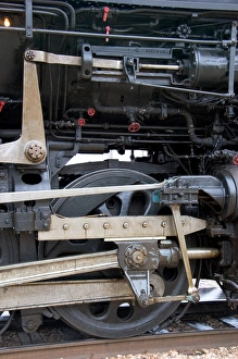 Close up detail view of a steam locomotive drive wheel Close up detail view of a steam locomotive drive wheel