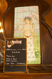 A closeup of the menu on a chalk black board blackboard chalkboard with Lillet written A closeup of the menu on a chalk black board blackboard chalkboard with Lillet written
