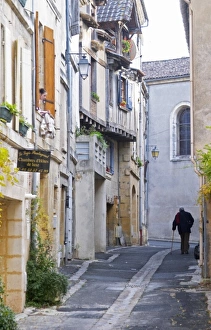 A cobble stone street and old cross beam half timber and stone houses in the Old Town A cobble stone street and old cross beam half timber and stone houses in the Old Town