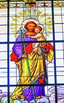 Colorful Saint Joseph Father Baby Jesus Lily Stained glass Cathedral Puebla, Mexico Colorful Saint Joseph Father Baby Jesus Lily Stained glass Cathedral Puebla, Mexico