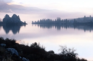 Columbia river; Wahkiakum county, Washington; calm; smooth; dawn; fog; quiet Columbia river; Wahkiakum county, Washington; calm; smooth; dawn; fog; quiet