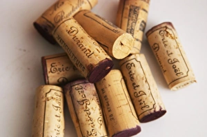 Corks stampled with Eric and Joel Durand against a white background Corks stampled with Eric and Joel Durand against a white background