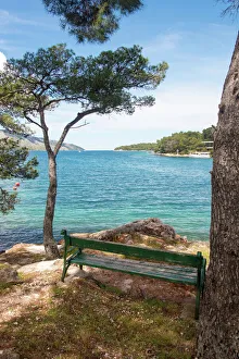 Croatia, Hvar Island, Stari Grad. Picturesque waterfront spot for bench Croatia, Hvar Island, Stari Grad. Picturesque waterfront spot for bench