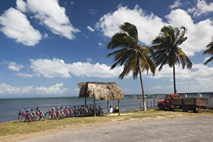 Cuba, Pinar del Rio Province, Puerto Esperanza, bicycles by the seashore Cuba, Pinar del Rio Province, Puerto Esperanza, bicycles by the seashore