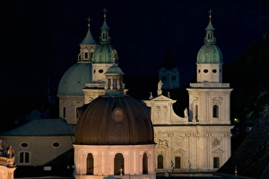 Dome of Franziskanerkirche in front of the Dom (cathedral) in Old Salzburg, Austria Dome of Franziskanerkirche in front of the Dom (cathedral) in Old Salzburg, Austria