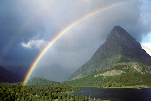 A double rainbow hangs over Grinnel Point in Glacier National Park, in Montana, USA A double rainbow hangs over Grinnel Point in Glacier National Park, in Montana, USA
