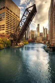 A drawbridge spans the Chicago river in Illinois A drawbridge spans the Chicago river in Illinois