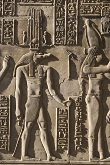 Egypt, Pom Ombo. Sidelight makes the hieroglyphics stand out in strong relief Egypt, Pom Ombo. Sidelight makes the hieroglyphics stand out in strong relief