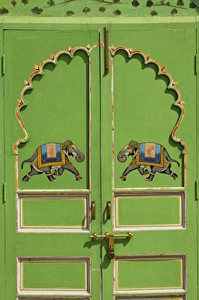 Elephants painted on green door, City Palace, Udaipur, India Elephants painted on green door, City Palace, Udaipur, India