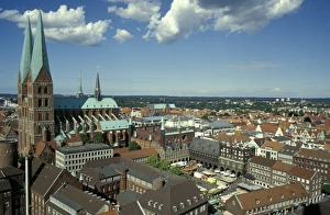 Europe, Germany, Lubeck. Old city center, Kohl market square. St. Marien church on left Europe, Germany, Lubeck. Old city center, Kohl market square. St. Marien church on left