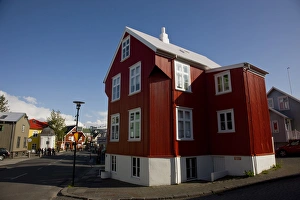 Europe, Iceland, Reykjavik. A red, metal-siding building being used as a gallery Europe, Iceland, Reykjavik. A red, metal-siding building being used as a gallery