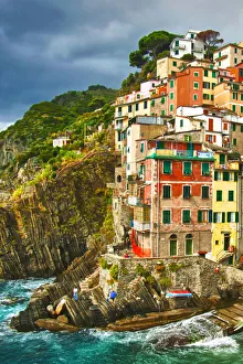 Europe, Italy, Tuscany, Cinque Terre. The stunning shoreline of Riomaggiore in Cinque
