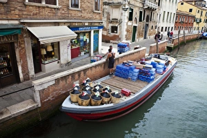 Europe; Italy; Venice; Merchants Delivering Goods Along Side Canals of Venice Europe; Italy; Venice; Merchants Delivering Goods Along Side Canals of Venice