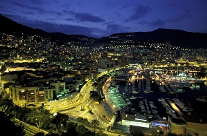 Europe, Monaco. View of port looking towards Monte Carlo, evening Europe, Monaco. View of port looking towards Monte Carlo, evening