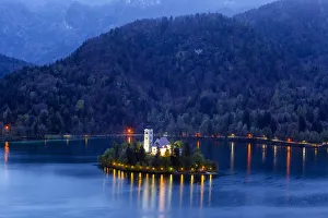 Europe, Slovenia. Lake Bled at sunset. Credit as: Jim Nilsen / Jaynes Gallery / DanitaDelimont Europe, Slovenia. Lake Bled at sunset. Credit as: Jim Nilsen / Jaynes Gallery / DanitaDelimont