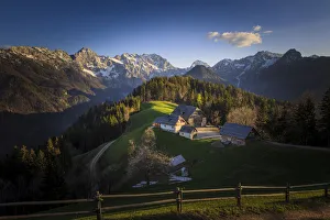 Europe, Slovenia, Logarska Dolina. Mountain farm houses at sunset Europe, Slovenia, Logarska Dolina. Mountain farm houses at sunset