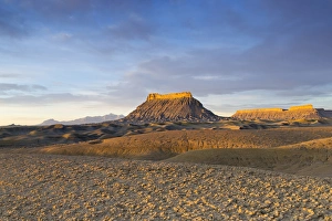 Factory Butte and North Caineville Mesa in the Upper Blue Hills near Hanksville, Utah Factory Butte and North Caineville Mesa in the Upper Blue Hills near Hanksville, Utah