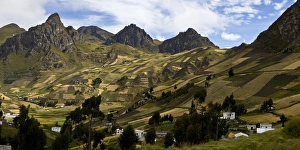 Farmers huts and fields climb up the hillsides in the highlands of Cotopaxi Province Farmers huts and fields climb up the hillsides in the highlands of Cotopaxi Province