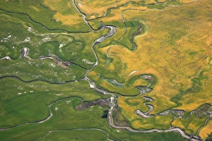 Farmland and meandering streams, near Omarama, North Otago, South Island, New Zealand Farmland and meandering streams, near Omarama, North Otago, South Island, New Zealand