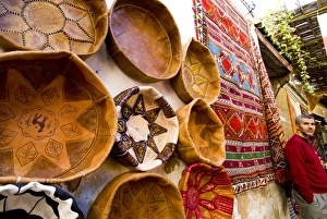Fez Morocco leather baskets & Oriental carpet and proprietor in the old medina Fez Morocco leather baskets & Oriental carpet and proprietor in the old medina
