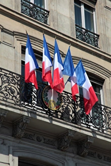 France. Paris. French national flags on a buiding France. Paris. French national flags on a buiding