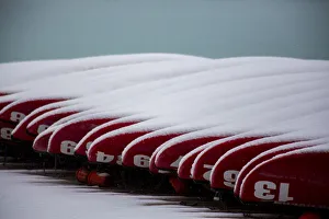 Fresh late summer snow on docked canoes Lake Louise, Banff National Park, Alberta, Canada Fresh late summer snow on docked canoes Lake Louise, Banff National Park, Alberta, Canada