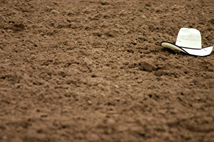 Galisteo, New Mexico, United States. Rodeo hat left in dirt at Galisteo Rodeo Galisteo, New Mexico, United States. Rodeo hat left in dirt at Galisteo Rodeo