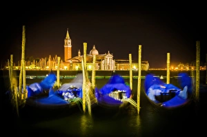Gondolas and San Giorgio Maggiore church at night, Piazza San Marco (St. Marks Square) Gondolas and San Giorgio Maggiore church at night, Piazza San Marco (St. Marks Square)