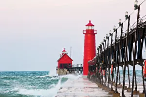 Grand Haven South Pier Lighthouse at sunrise on Lake Michigan, Ottawa County, Grand Haven Grand Haven South Pier Lighthouse at sunrise on Lake Michigan, Ottawa County, Grand Haven