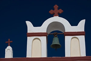 Greece and Greek Island of Santorini town of Oia with bell tower over looking the Greece and Greek Island of Santorini town of Oia with bell tower over looking the
