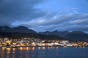 The harbor and city of Ushuaia at dusk on the island of Tierra del Fuego, Argentina The harbor and city of Ushuaia at dusk on the island of Tierra del Fuego, Argentina