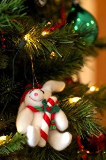 Holiday still life. Christmas tree with stuffed rabbit ornament. Property released Holiday still life. Christmas tree with stuffed rabbit ornament. Property released