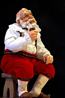 Holiday still life. Simpich Caracter doll, thinking Santa with pipe. Property released Holiday still life. Simpich Caracter doll, thinking Santa with pipe. Property released