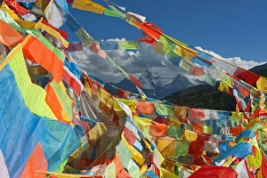 One of Three Holy Peaks of Yading Nature Reserve surrounded by Prayer Flags, Sichuan One of Three Holy Peaks of Yading Nature Reserve surrounded by Prayer Flags, Sichuan