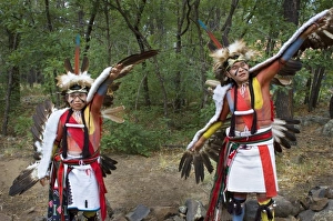 Hopi-Tewa eagle dancers dressed in traditional regalia of woven apron, sash, moccasins Hopi-Tewa eagle dancers dressed in traditional regalia of woven apron, sash, moccasins