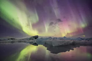 Images Dated 13th November 2012: Iceland, Jokulsarlon. Aurora lights reflect in lagoon