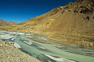 India, Ladakh, scenic rugged landscape with green river in the Himalayas India, Ladakh, scenic rugged landscape with green river in the Himalayas